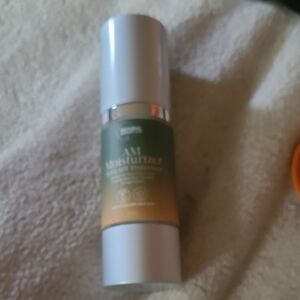 AM Moisturizer with Green and Silver Design